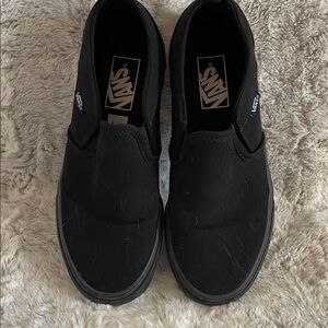 Vans women's Classic Black Slip-On Sneakers